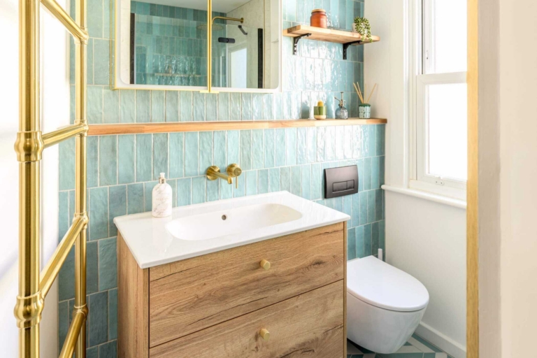 Luxury bathroom with freestanding tub and marble accents.