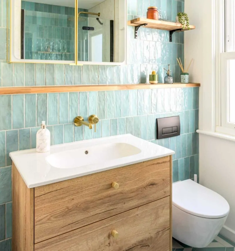 Luxury bathroom with freestanding tub and marble accents.