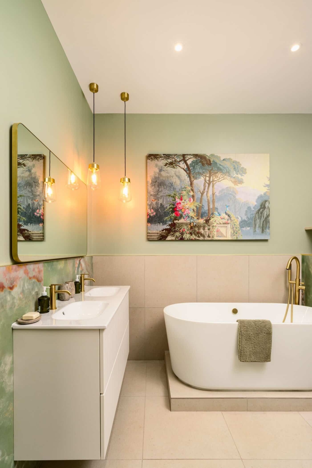Elegant bathroom with freestanding bathtub and gold fixtures by Pier1 Bathrooms.