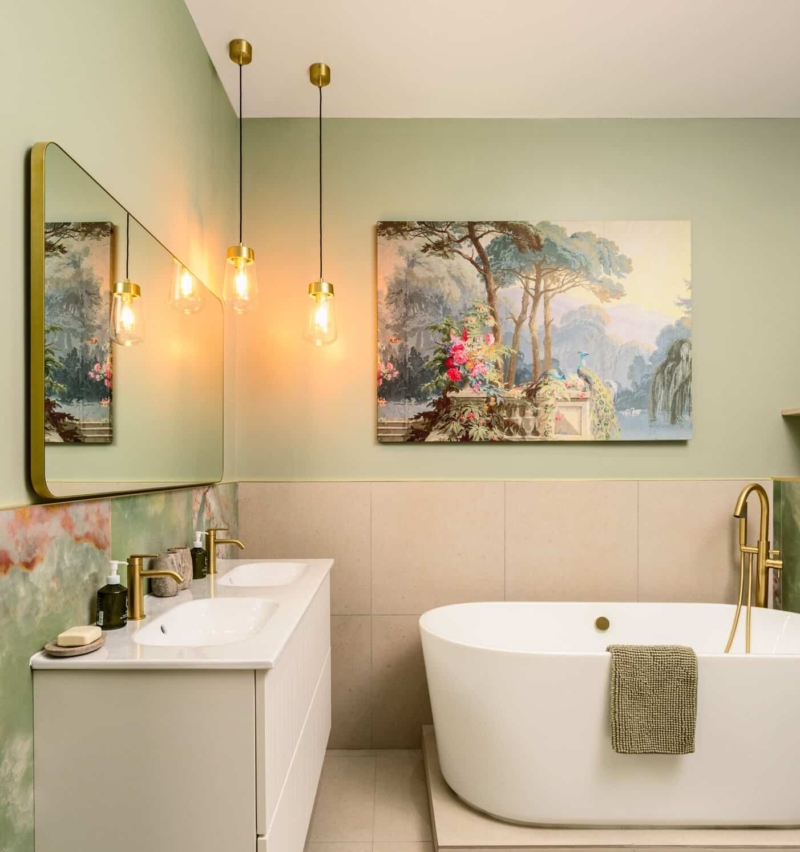 Elegant bathroom with freestanding bathtub and gold fixtures by Pier1 Bathrooms.