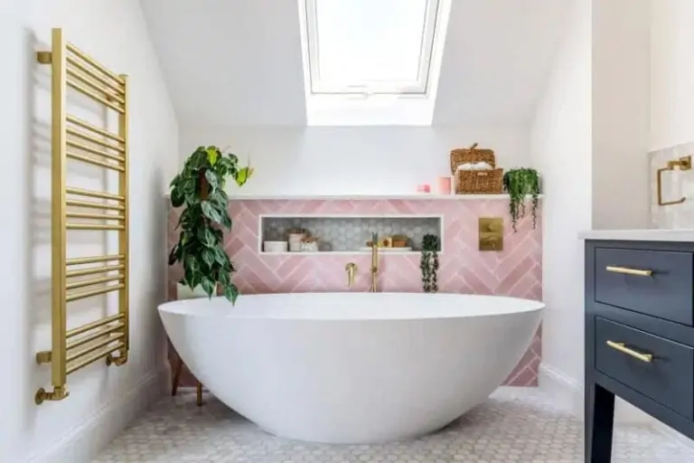 Pink bathroom with skylight, recessed storage niche and indoor greenery
