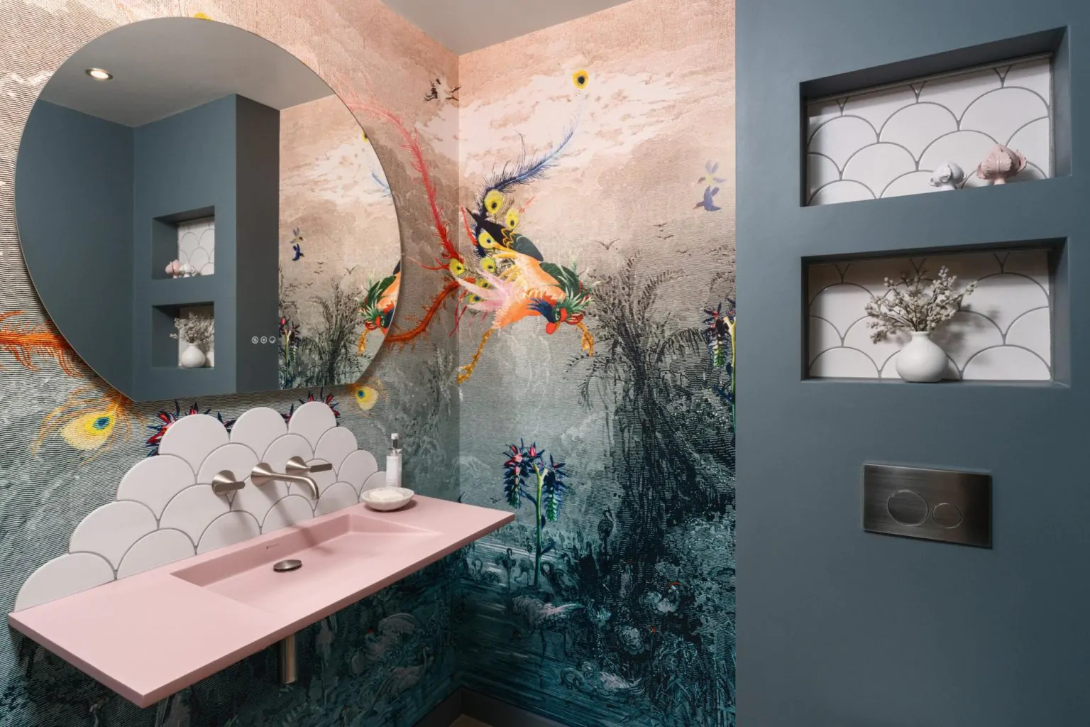 Statement bathroom with artistic mural wall and pink vanity
