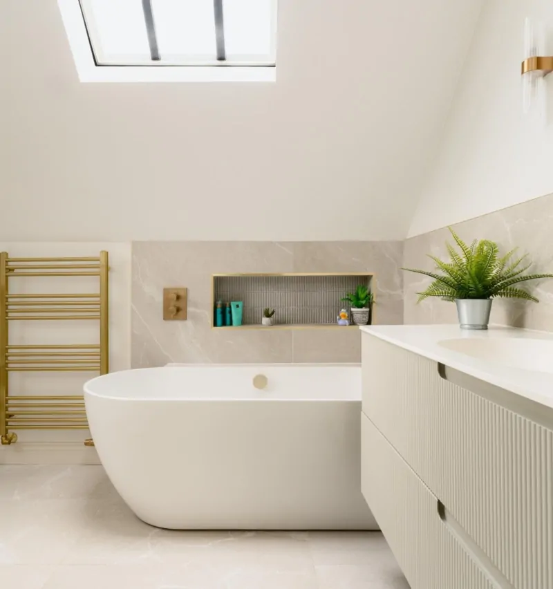 Bright luxury bathroom with skylight, recessed shelf and wooden towel ladder