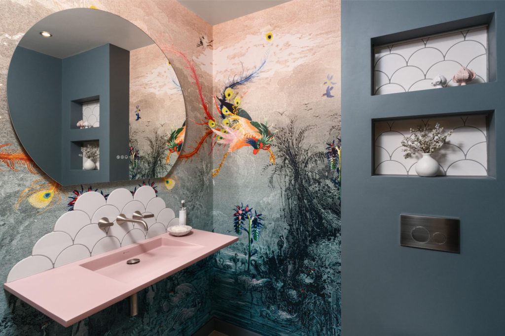 Bespoke bathroom vanity with artistic feature wall and contemporary mirror
