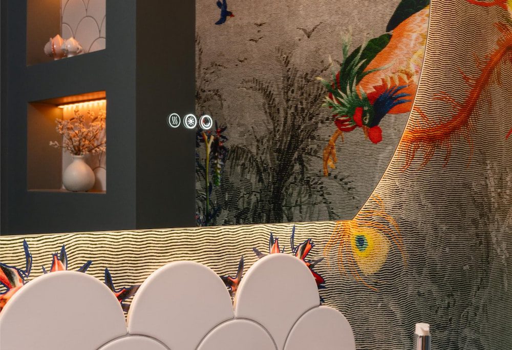 Decorative bathroom feature wall with artistic floral design and dark finishes